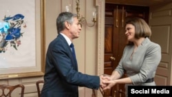 U.S. Secretary of State Antony Blinken greets Belarusian opposition leader Sviatlana Tsikhanouskaya at the State Department in Washington, July 19, 2021, in a photo posted by Tsikhanouskaya on her Twitter (@Tsihanouskaya).