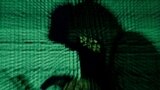 FILE PHOTO: A man holds a laptop computer as cyber code is projected on him in this illustration picture taken on May 13, 2017. Capitalizing on spying tools believed to have been developed by the U.S. National Security Agency, hackers staged a cyber…