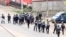 FILE - A still image taken from a video shows riot police walkin along a street in the English-speaking city of Buea, Cameroon, Oct. 1, 2017. 