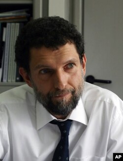 FILE - Osman Kavala, April 29, 2015.