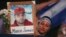 A demonstrator holds a photo of a person who died during anti-government protests in Managua, Nicaragua, April 25, 2018. 