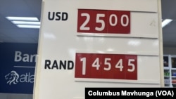 A retail shop in Harare, Zimbabwe, displays the new exchange rate of 25 ZiG to 1 U.S. dollar, the currency's lowest value since it was introduced in April.