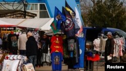 FILE PHOTO: A flag with the logo of Wagner private mercenary group is on display for sale in Yefremov