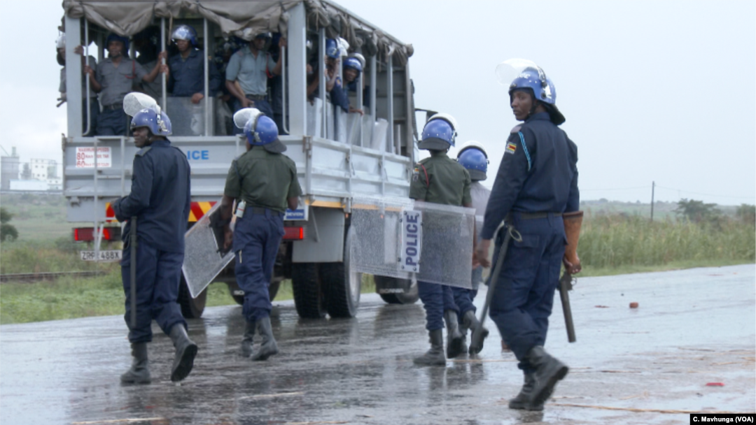 Police monitoring situation in Harare during Zimbabwe three-day protests, Jan. 2019.