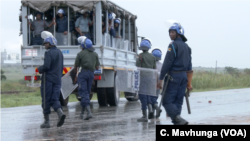 Police monitoring situation in Harare during Zimbabwe three-day protests, Jan. 2019.