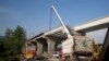 FILE - Work is in progress at a new international trade route near Havalian in Pakistan, May 11, 2017, as part of China's 'Belt and Road Initiative.'