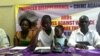 Itai Dzamara's wife, Sheffra, seen here with her brother-in-law Patson Dzamara and close associates. 