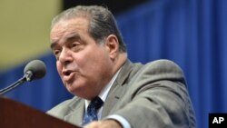 FILE - Supreme Court Justice Antonin Scalia speaks at Tufts University in Medford, Massachusetts, Oct. 2, 2013.