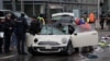 Police work at a car which drove into a crowd in Munich, Germany, Feb. 13, 2025, injuring several people.