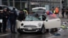 Police work at a car which drove into a crowd in Munich, Germany, Feb. 13, 2025, injuring several people.