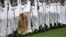 FILE - Graduating cadets march during a graduation and commissioning ceremony at the U.S. Military Academy in West Point, New York, May 21, 2016. In a reversal, West Point has seen a spike in sexual assualt reports last year.