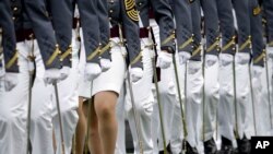 FILE - Graduating cadets march during a graduation and commissioning ceremony at the U.S. Military Academy in West Point, New York, May 21, 2016. U.S. military academies saw a rise in sexual assault reports last year.