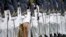 FILE - Graduating cadets march during a graduation and commissioning ceremony at the U.S. Military Academy in West Point, New York, May 21, 2016. U.S. military academies saw a rise in sexual assault reports last year.
