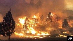 The Klamathon Fire burns in Hornbrook, Calif., July 6, 2018. By Sunday, the fire had grown significantly and had crossed the border into Oregon.