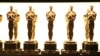 FILE - Oscar statuettes appear backstage at the Oscars in Los Angeles on Feb. 26, 2017.