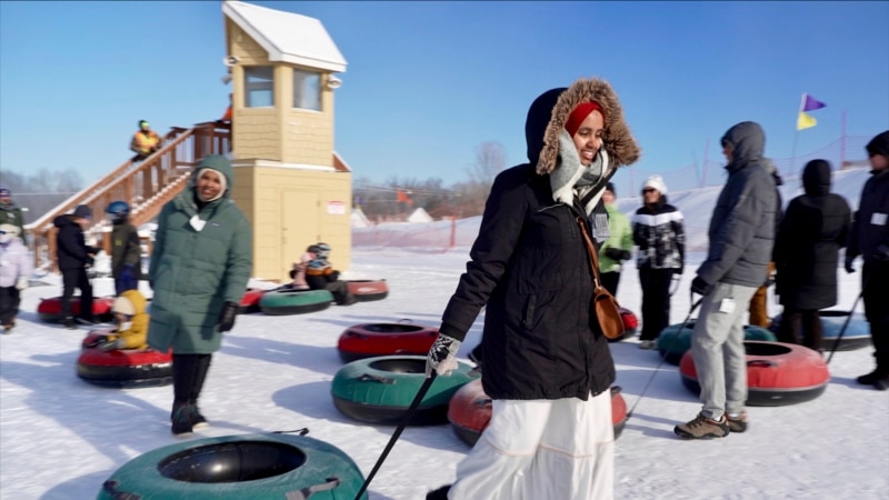 Scarves over headscarves, Muslim women’s outdoors group tackles snow tubing in Minnesota