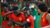 Jogadores angolanos celebram a passagem aos quartos-de-final do CAN 2023, Estádio da Paz, Bouaké, Costa do Marfim, 27 jan 2924