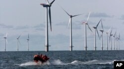 (FILE) Offshore windmills in the North Sea near the village of Blavandshuk near Esbjerg, Denmark.