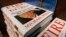 A stack of reserved "Fire and Fury" books by writer Michael Wolff sit on a shelf in a bookstore in Richmond, Va., Jan. 5, 2018.