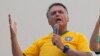 Mantan Presiden Brazil Jair Bolsonaro menyapa para pendukungnya dalam sebuah kampanye di Sao Paulo, Brazil, pada 25 Februari 2024. (Foto: AP/Andre Penner)