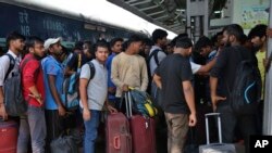 National Institute of Technology (NIT) students who left Srinagar, Kashmir's main city wait to leave for their respective homes at the railway station in Jammu, India, Aug. 4, 2019. 