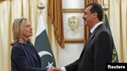 U.S. Secretary of State Hillary Clinton meets with Pakistan's Prime Minister Yusuf Raza Gilani in Islamabad, Pakistan, October 20, 2011.