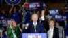 Democratic presidential candidate former Vice President Joe Biden speaks at a primary election night campaign rally, March 3, 2020, in Los Angeles with his wife Jill Biden, left, and his sister Valerie. 