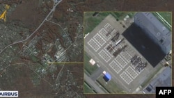 TOPSHOT - This handout from South Korea's National Intelligence Service (NIS) released on October 18, 2024 shows a satellite image by Airbus Defence and Space of Russia's Ussuriysk military facility, where the NIS said North Korean personnel were gathered