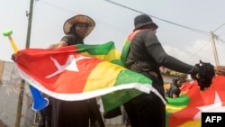 Des Togolaises protestent contre le pouvoir dans les rues de Lomé, au Togo, le 20 janvier 2018.