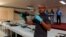 A Maldives police officer shows weapons found during investigations into a Sept. 28 blast on a speedboat transporting Maldives President Abdulla Yameen, October 31, 2015.