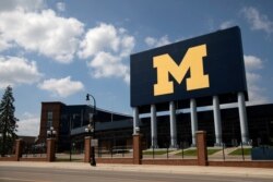 FILE - An empty Michigan Stadium is seen on the University of Michigan campus amid reports of college football cancellation, during the outbreak of the coronavirus disease (COVID-19), in Ann Arbor, Michigan, August 10, 2020.
