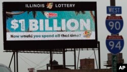 A digital billboard along I-90/94 highway in Chicago, displays the estimated Mega Millions jackpot, Oct. 19, 2018. 