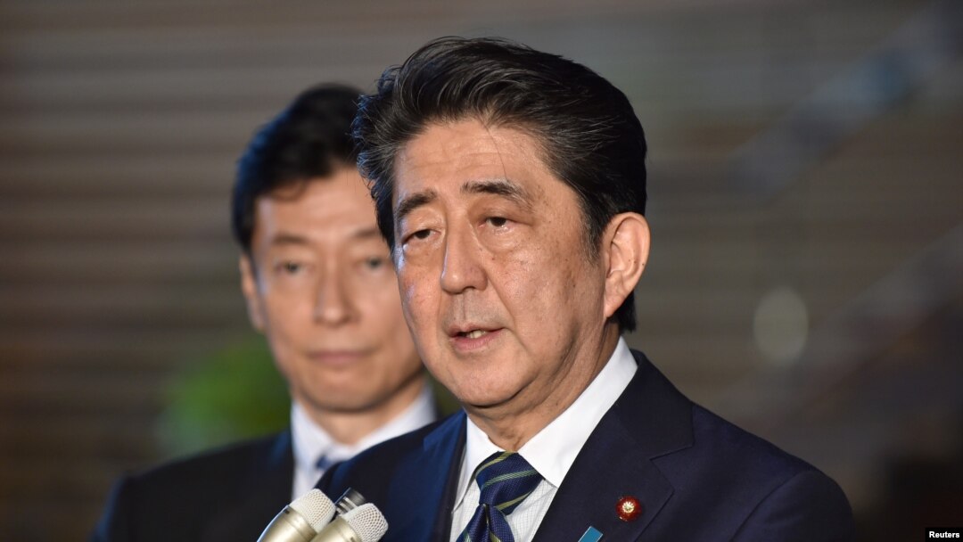 FILE - Japan's Prime Minister Shinzo Abe speaks to reporters at Abe's official residence in Tokyo, June 6, 2018.