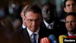 Presiden Brazil Jair Bolsonaro memberikan pernyataan pers di Istana Alvorada di Brasilia, Brazil, 1 November 2022. (Foto: REUTERS/Adriano Machado)