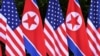 FILE - U.S. and North Korean flags stand side by side at the site of a summit between U.S. President Donald Trump and North Korea's leader Kim Jong Un, on Sentosa island in Singapore, June 12, 2018.