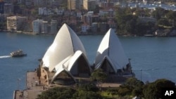 This recent photo shows Sydney's famous landmark, the Sydney Opera House (C), with the Royal Botanic Gardens and Government House (below).