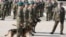 Polish army dogs and their handlers are seen during a ceremony in Nowy Dwor Mazowiecki, Poland, Sept. 6, 2024. 
