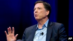 FILE - Former FBI director James Comey has challenged in court a subpoena from the House of Representatives. Lawyers for Comey argued Nov. 29, 2018, that he shouldn’t have to appear for a closed-door interview with lawmakers next week.