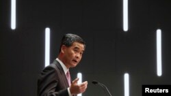 Hong Kong Chief Executive Leung Chun-ying speaks during a news conference following his maiden policy address in Hong Kong, January 16, 2013 file photo. 