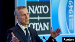 FILE - NATO Secretary-General Jens Stoltenberg speaks to the media at the State Department in Washington, April 4, 2019. 