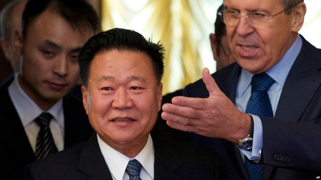 FILE - Russian Foreign Minister Sergey Lavrov, right, welcomes North Korea's special envoy Choe Ryong Hae during their meeting in Moscow, Russia, Nov. 20, 2014.