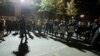 A crowd gathers during a Black Lives Matter protest at the Mark O. Hatfield United States Courthouse in Portland, Ore, July 30, 2020, as after days of clashes with federal police, the crowd remained peaceful.