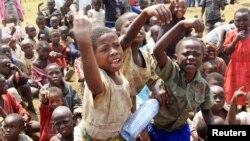 Children displaced by fighting in north Kivu province in the Democratic Republic of Congo (DRC) play at Nyakabande refugee transit camp in Kisoro, Uganda, July 13, 2012. 