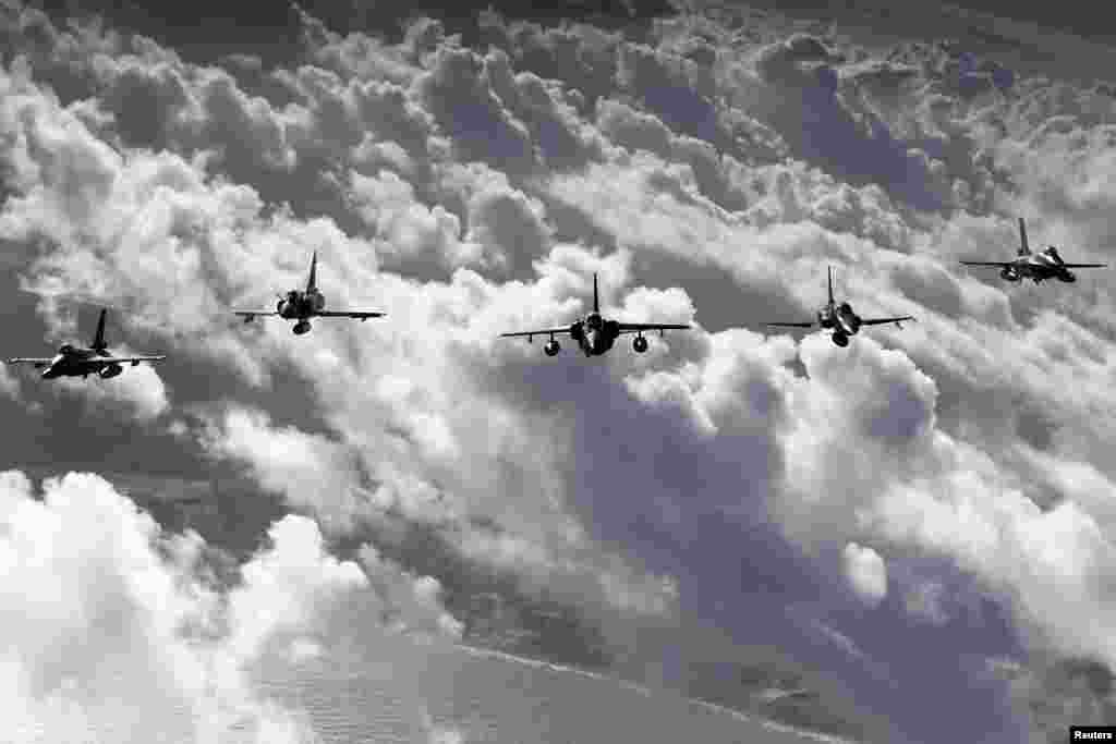 Jet fighters take part in CRUZEX, a multi-national air exercise hosted by the Brazilian Air Force, in the city of Natal in Rio Grande do Norte, Nov. 5, 2013.