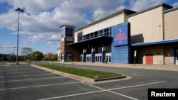 A Regal Cinemas is closed due to the outbreak of coronavirus disease (COVID-19) in Arlington, Virginia, U.S. April 10, 2020. (REUTERS/Joshua Roberts)