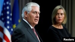 U.S. Secretary of State Rex Tillerson and European Union foreign policy chief Federica Mogherini address a joint news conference at the European Council in Brussels, Belgium, Dec. 5, 2017. 