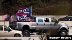 Trump vehicle caravan travels down highway in California, Nov. 2, 2020.