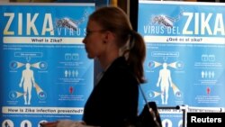 FILE - Material to prevent Zika infection by mosquitoes are displayed at the 69th World Health Assembly at the United Nations European headquarters in Geneva, Switzerland, May 23, 2016.