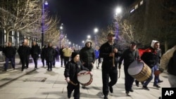 Supporters of left-wing Vetevendosje! party celebrate following results of a parliamentary election, in Pristina, Kosovo, Feb. 9, 2025.