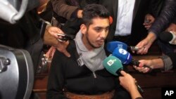 Severin Krassimirov, the suspect arrested in the rape and slaying of a Bulgarian television journalist, is seen prior to his first appearance in court, in Ruse, Bulgaria, Oct. 19, 2018.